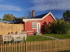 Koselig hytte p&aring; g&aring;rdstun i Oslo, caba&ntilde;a o casa de campo en Oslo