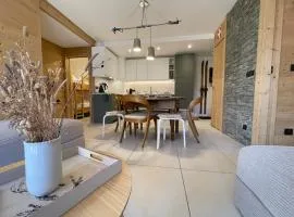 Appartement 8 personnes neuf au cœur du village