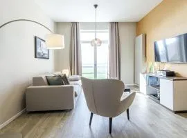 Ostseeglück - 5-Sterne-Ferienwohnung mit Südbalkon und Blick zum Saaler Bodden
