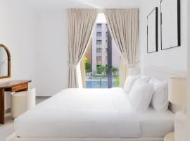 Sahab - Panoramic pool view 1BR Tiraz Building