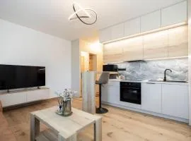 ALURE RESIDENCES 9 & 24h self check-in, private parking in front of the apartment building included, new building, terrace, the apartment building has its own park with a lake and outdoor fitness, children's playground, CITY CENTER