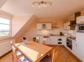 Storchenflug - Dachgeschosswohnung mit Kamin & Balkon am Fleesensee