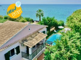 Beachfront Villa Rania with private pool by DadoVillas, hotel in Halikounas