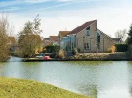 Bungalow in Zeeland with Stunning Waterside Views