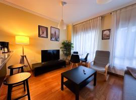 Apartamento con garaje, c&eacute;ntrico y luminoso，位于庞特维德拉的带热水浴缸的酒店