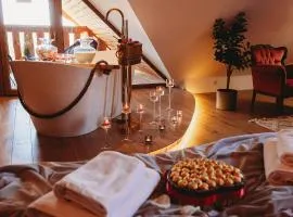 Apartament z wanną wolnostojącą