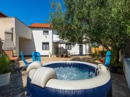 Adorable home with private garden and bubble bath