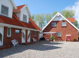 Anker mit umzäunter Sonnenterrasse, hotell i Gollendorf