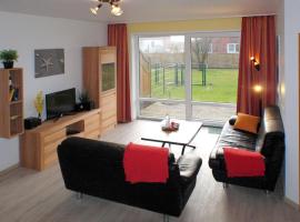 Seestern mit umzäunter Terrasse, hotell i Gollendorf