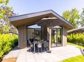 Chalet by Pond with Sauna