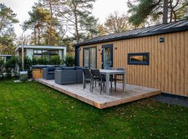 Wellnesshuisje in de Sallandse Heuvelrug, chal&eacute; alpino em Haarle