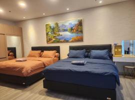 Spacious 2 King Bed Family Room 56 Sqm PODOMORO APARTMENT Tower Liberty 21st Floor with Mall Direct Access, apartmán v destinaci Medan