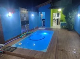 Casa com Ar e piscina no centro
