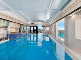 Fancy home with water view in the rocks