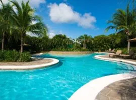 3rd-floor space with modern décor recently renovated viewing over pool in Coco