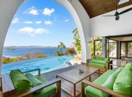 Dreamy Spanish-Style Villa with Sweeping Ocean Views, Elegant Nautical Design & Giant Infinity Pool
