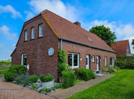 Ferienhaus Oll Smee 9 Huus EEN mit Terrasse, Grill und kleinem Garten, отель в городе Вердум