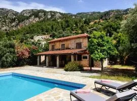 Stone house in Faralya