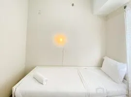 Modern and Homey 2BR at Springlake Summarecon Bekasi Apartment By Travelio