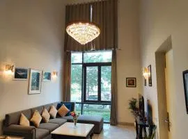 Hostie Evanya - 2BHK Serviced Apartment near Golf Course Road