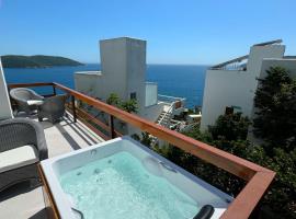 Suíte Atenas com hidro aquecida - Arraial do Cabo，位于阿拉亚尔-杜卡布的酒店