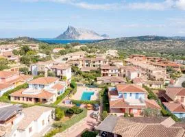 ISA-Residence with swimming-pool in Cala Girgolu, apartments with private outdoor area