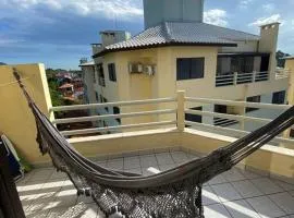 Cobertura pé na areia