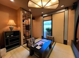 Hotel Karakonosato 唐比の里, hotel con hidromasaje en Isahaya