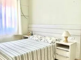 Quarto em apto compartilhado com anfitrião