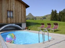 Modern apartment with swimming pool in Damüls