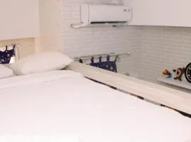 Stunning and Comfy Studio Apartment Transpark Juanda By Travelio