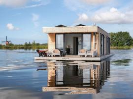 Surla houseboat Hangloose Kagerplassen, ubytování na lodi v destinaci Buitenkaag