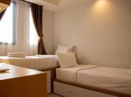 Modern and Classic 1BR at Evenciio Margonda Apartment By Travelio