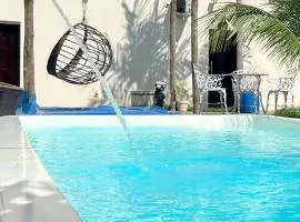 A Casa Paradisíaca ll Luxo Piscina Super Mega Quente até 50 graus Aquecimento Elétrico e Solar Casa com Sauna a Vapor e Ar Condicionado em Todos Ambientes e Lavanderia com Roupa de Cama e Banho