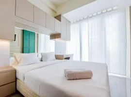 Cozy Stay Studio at Tree Park City BSD Apartment By Travelio