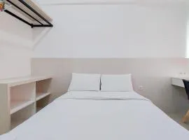 Minimalist Studio at Poris 88 Apartment By Travelio