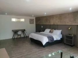 Room 1 of 8 Cozy Suites at The Hilltop Guesthouse