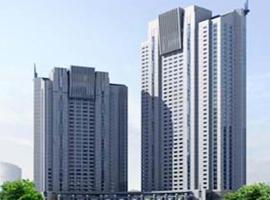 Qingdao Housing International Hotel، فندق في تشينغداو