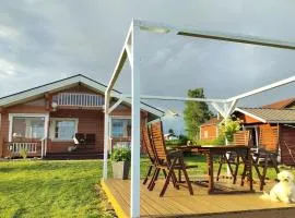 Hirsimökki harjulla