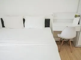 Elegant and Strategic 2BR Sky House BSD Apartment By Travelio