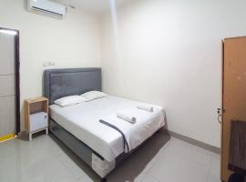 D Cost 19 Syariah Mitra RedDoorz, ξενοδοχείο σε Palas 2