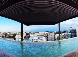 Modern 2-Bedroom, 2-Bath Apartment in the Heart of Playa del Carmen- Arenis Condos