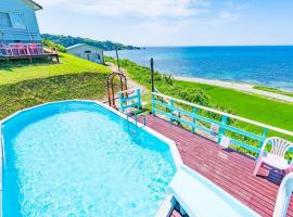 The Seaside Villa 佐渡島, hotel com banheiras de hidromassagem em Sado