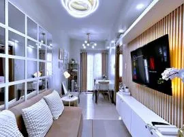 Cozypura Staycation near MOA, Airport , with free fast WIFI, Netflix and pay parking