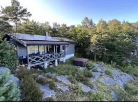 Cottage, boat, spa, private dock, Lillesand, hotel com spa em Lillesand