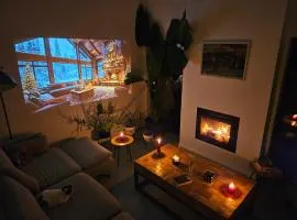 Black Walnut House with indoor outdoor fireplace