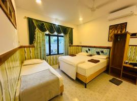 LUXO beach inn, Hotel in Rasdu