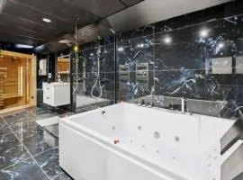 Love Room - Suite avec jacuzzi et sauna privatif