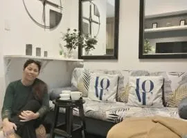Cozy New 1BR Fame Residences Condo with Balcony