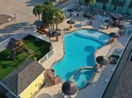 Shared Resort-Style Pool Playground Patio w Bar Tidal Times by AvantStay